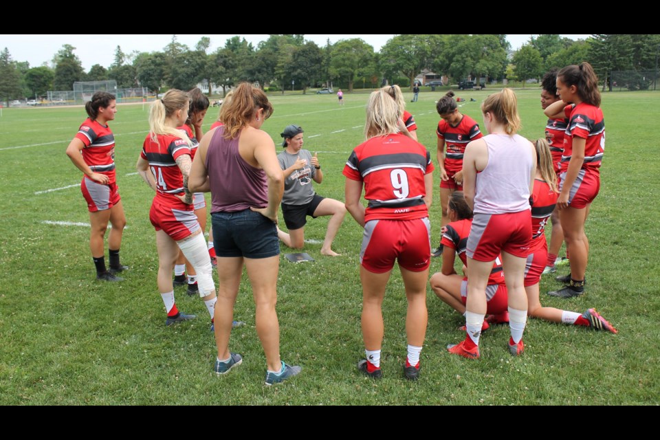 Guelph Redcoats coach J.A. Gibson gives instructions to her team during the 2022 Ontario Women's League season. The OWL is the top senior women's rugby league in Ontario,
