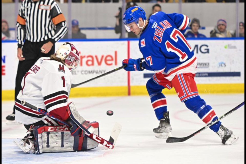 Former Guelph Storm Danny Zhilkin tries to score on Guelph goaltender Patrick Leaver in Kitchener on Friday.