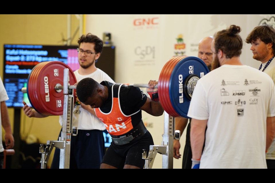Guelph's Kafui Hotsonyame attempts the squat during the 2023 North American Powerlifting Championships in the Cayman Islands.