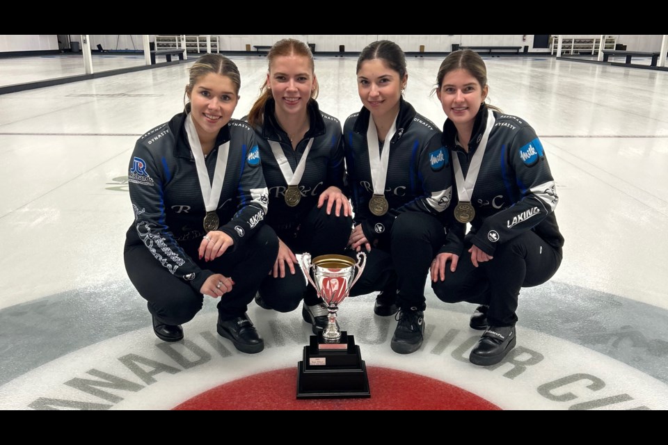 Team Artichuk skip Emma Artichuk, left, third Lauren Rajala, second Kailee Delaney and Guelph's Tori Zemmelink (lead) pose with the WFG Canadian Junior Cup after winning the tournament and qualifying for the Swiss Junior Cup.