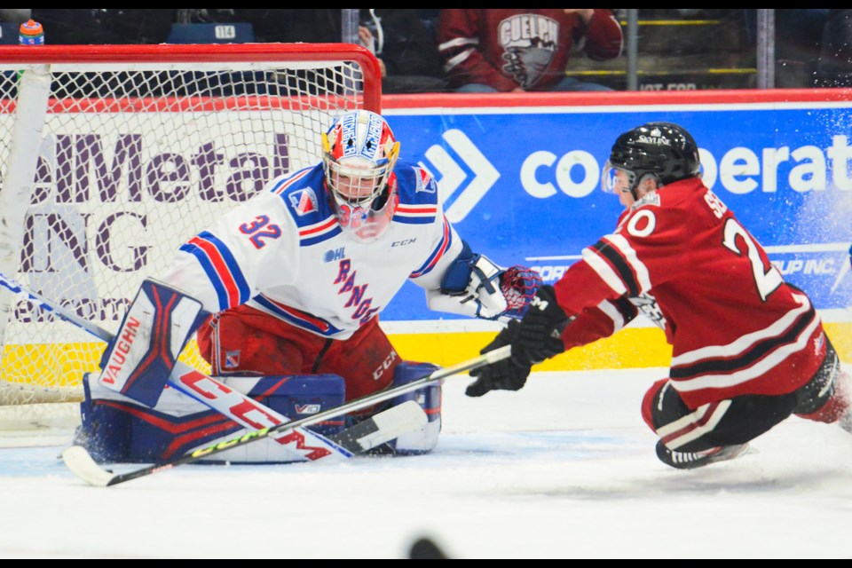 KItchener Rangers goaltender Jackson Parsons stops the Guelph Storm's Leo Serlin on a shorthanded breakaway in the first period Wednesday at the Sleeman Centre.