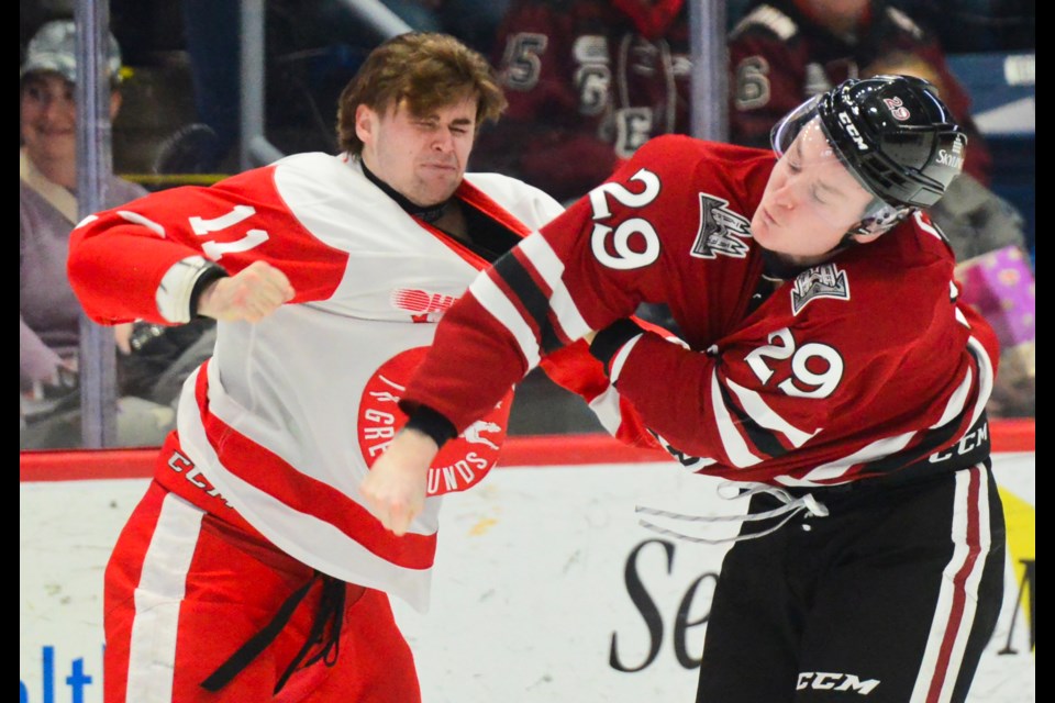 Sault Ste. Marie's Justin Dezoete fights the Guelph Storm's Brody Crane in the first period Monday at the Sleeman Centre.