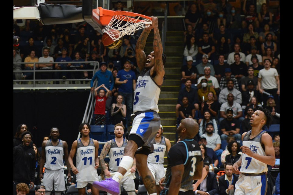 Ahmed Hill of the Guelph Nighthawks throws down a dunk Thursday night at the Sleeman Centre in the team's season-opening game. Tony Saxon/GuelphToday