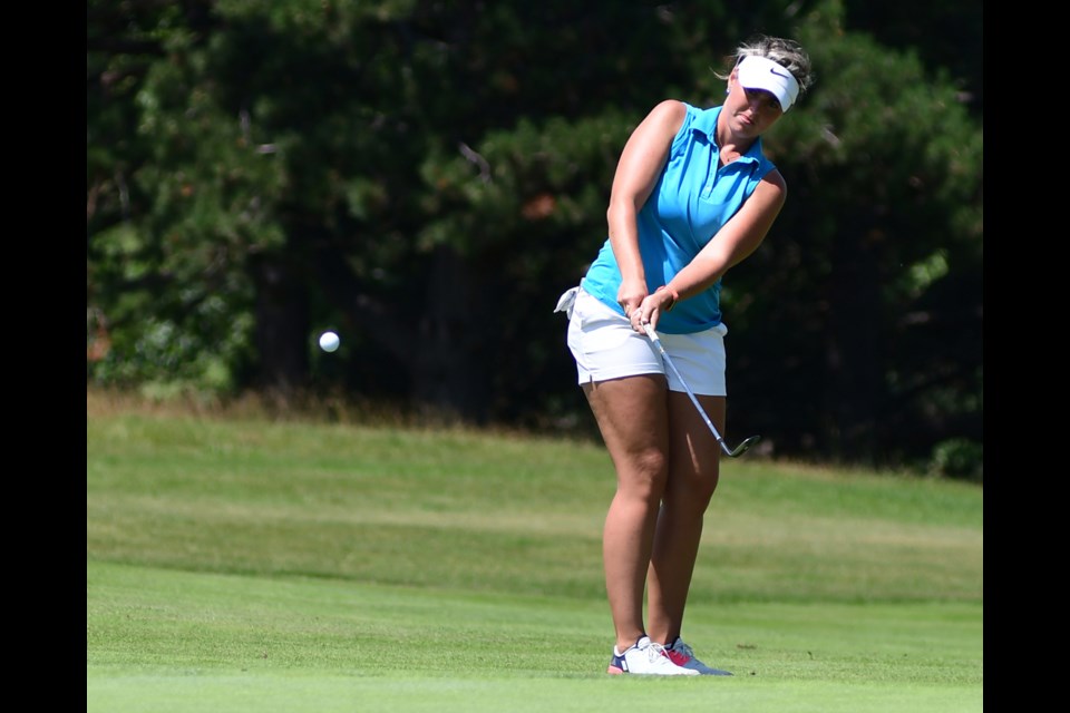 Rachel Pollock of Guelph watches the ball as she chips onto a green during the opening round of Golf Canada's women's amateur championship tournament Tuesday at Cutten Fields. Pollock is a three-time women's club champion at the host course. Rob Massey for GuelphToday