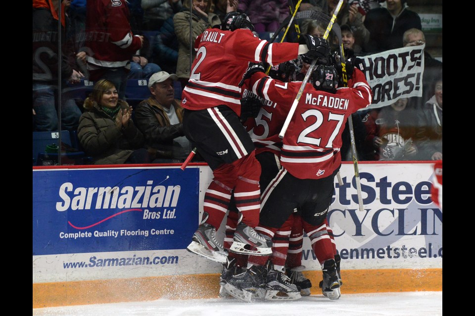 Guelph Storm players celebrate Nic Sicoly's first period goal against the Ottawa 67's Friday, March 4, 2016 at the Sleeman Centre. Tony Saxon/GuelphToday