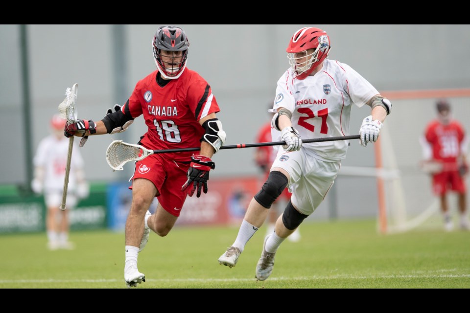 Guelph native Trent DiCicco is challenged by a member of Team England in game action at the 2022 U21 men's lacrosse World Cup in Limerick, Ireland.