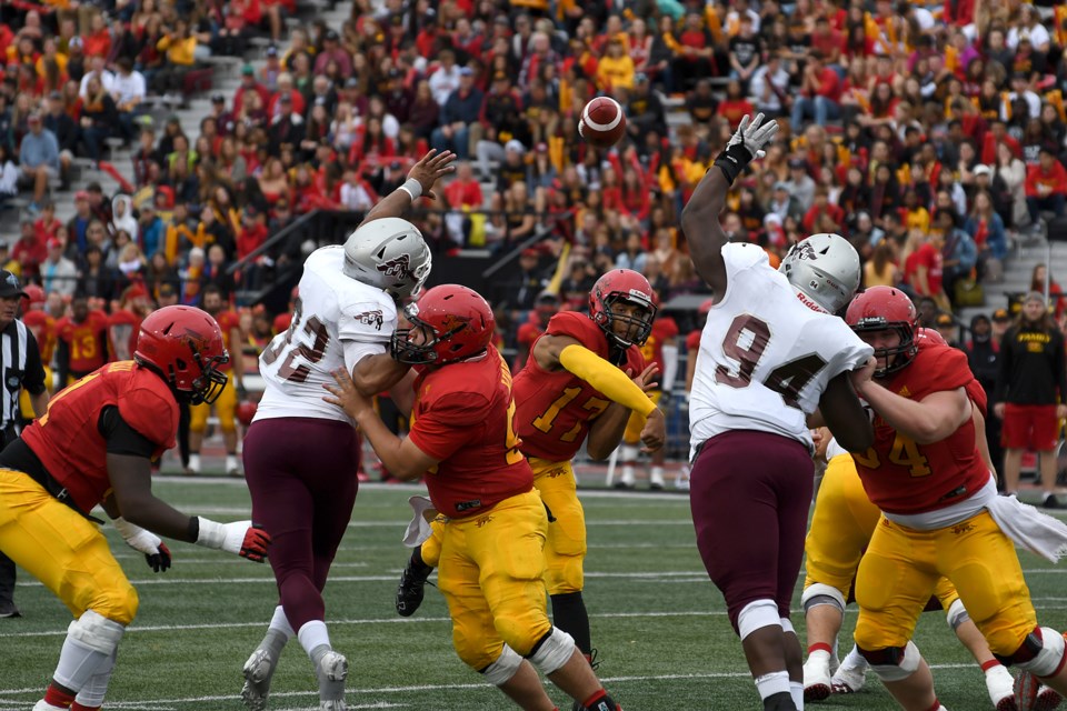 Quarterback Theo Landers of the Guelph Gryphons throws a pass during Saturday's Homecoming Game against the Ottawa Gee-Gees at Alumni Stadium. The Gryphons won 33-6. Rob Massey for GuelphToday
