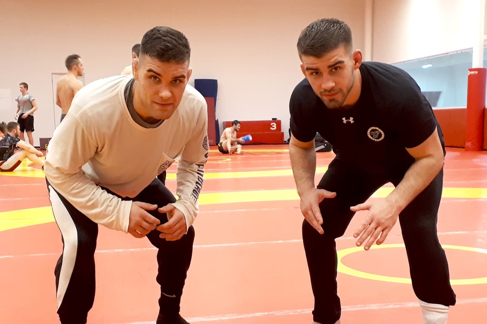 Alexander Chaves, left, and his brother Simon Chaves are hoping to bring more wrestling glory to the Guelph Gryphons and Guelph Wrestling Club. Rob Massey for GuelphToday