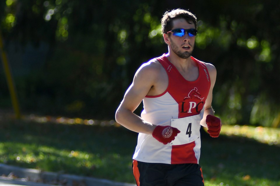 Pro triathlete Jackson Laundry of Guelph legs it out during the Thanksgiving Day Road Races around Exhibition Park in October of 2016. Rob Massey photo