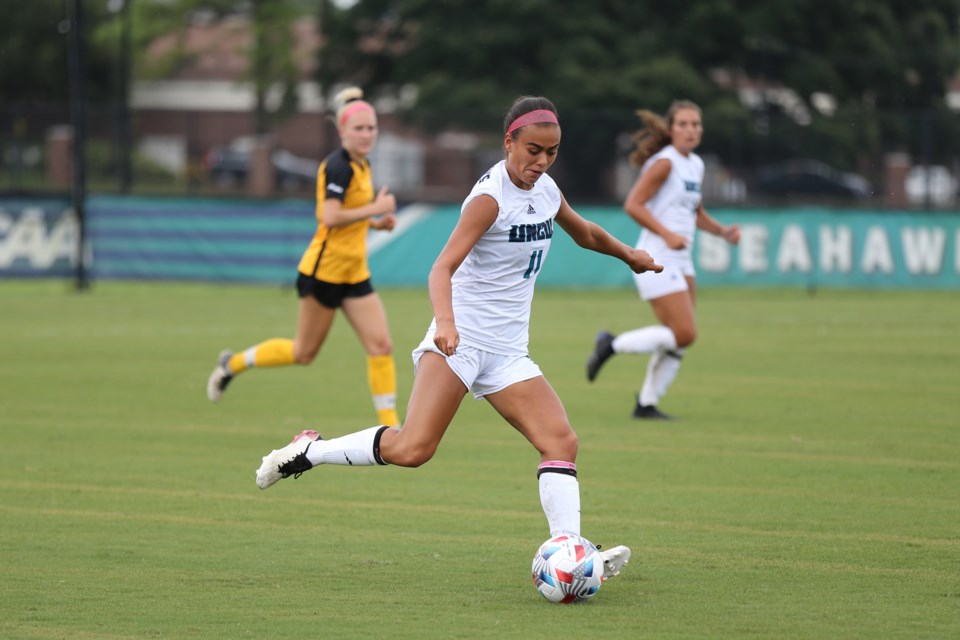 Guelph's Jordan Faveri (11) of the University of North Carolina Wilmington Seahawks leads an attack during an NCAA women's soccer match against Virginia Commonwealth this season. A forward, Faveri started 13 of the 14 games she played this season, but missed the final two due to a sprained ankle.