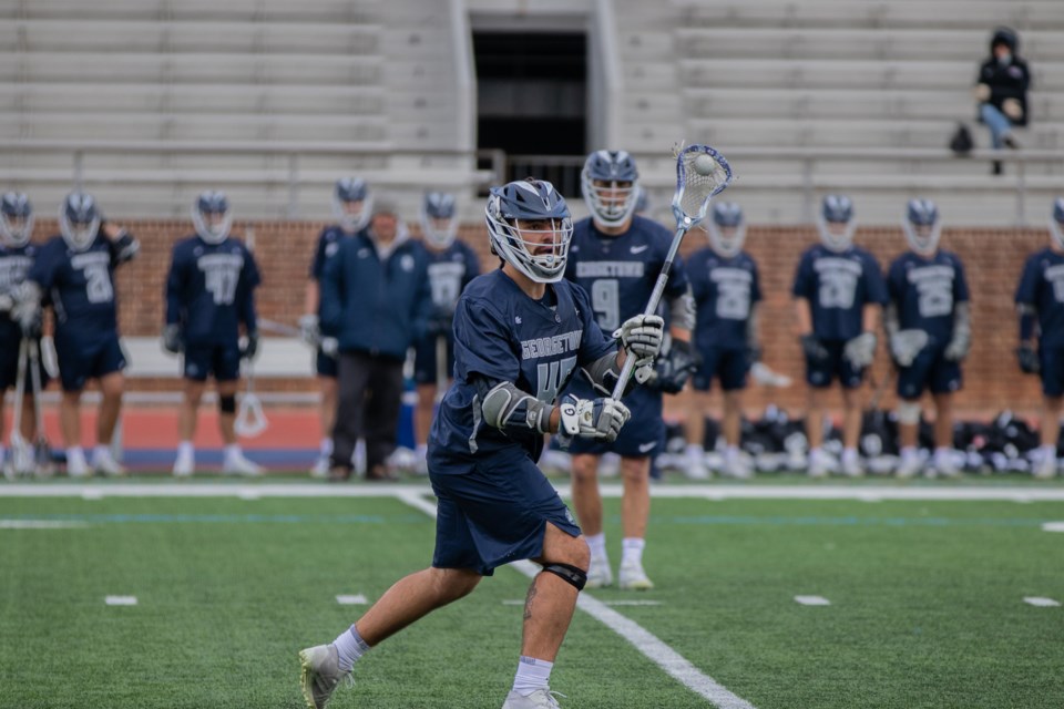 Guelph's Dylan Watson of the Georgetown Hoyas gets set to pass the ball during NCAA men's lacrosse play against Penn in Philadelphia earlier this month. Watsoon had a pair of goals in a 10-8 win.