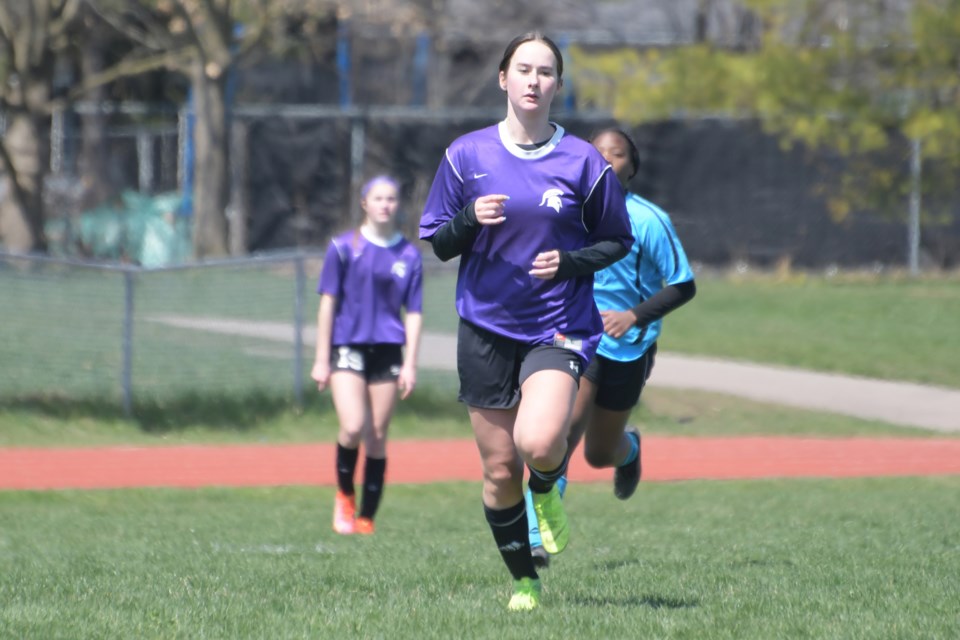 Isabelle Parson of the Centennial Spartans runs back into her own zone during District 10 high school girls' soccer play against the Bishop Macdonell Celtics last week. Parson is to join the University of Mary Marauders in Bismarck, N.D., this summer for NCAA Division 2 play.