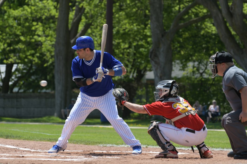 Batter Justin Interisano of the Guelph Royals keeps his eye on the baseball during the Royals' preseason game against the Guelph Gryphons last month at Hastings Stadium. 