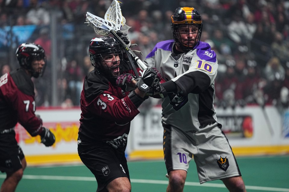 Anthony Joaquim (33) of the Colorado Mammoth keeps Kevin Crowley (10) of the San Diego Seals in check during National Lacrosse League play last month in Denver. Joaquim was traded to the Mammoth last season.