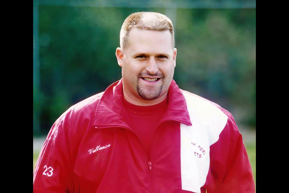 Dave Vallance of the Guelph Gators midget girls' softball team is seen in a photo from the 1995 national championship tournament in Surry, B.C. The Gators won the Canadian title in 1997 and 2005 and also hosted the tournament twice. Vallance is to be inducted into the Guelph Sports Hall of Fame this month.