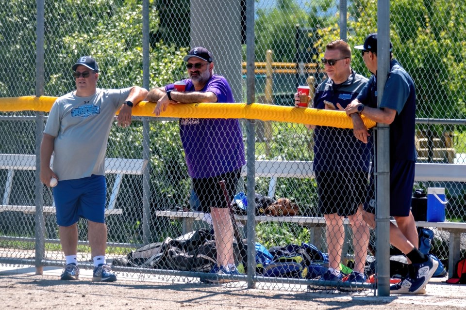 Members of the Guelph Silvercreeks coaching staff watch the team's practice session at Pearson Park Sunday. The coaching staff includes Paul Cutten, John Lannutti, Fred Loder (not in photo), Mark Smit and Richard Zytner.