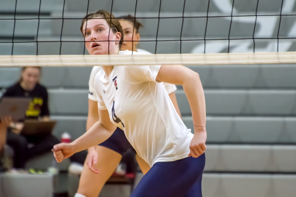 Robin Melnick of the University of Toronto Varsity Blues keeps her eyes on the play as she moves into position during OUA women's volleyball play against the University of Guelph Gryphons last week at the Guelph Gryphons Athletics Centre.