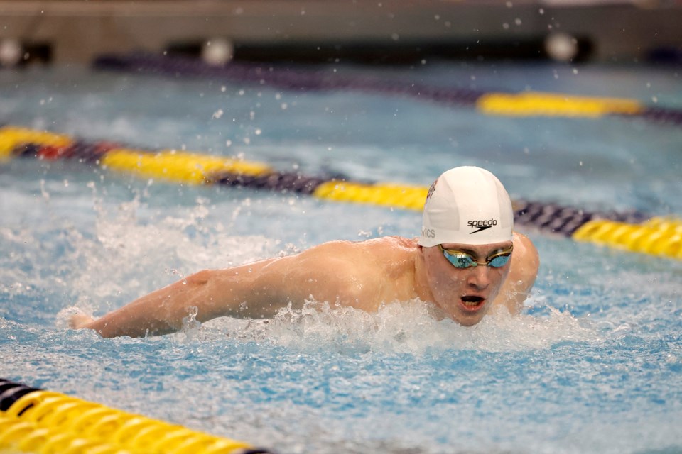 Puslinch's Tristan Jankovics competes for the Ohio State Buckeyes in a breaststroke leg of an individual medley race at last year's Big Ten conference swimming championships. He's hoping to swim Canada in this year's Summer Olympics.