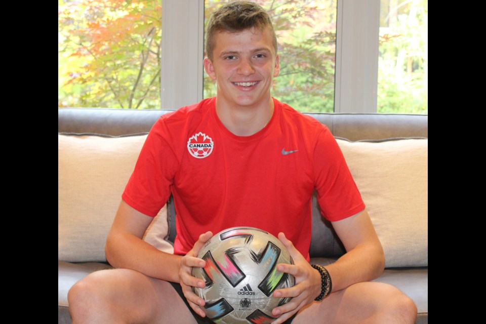Simon Guardiero, 16, sits in his Guelph home after a long week of domestic camp with Canada's men's under-17 soccer team.