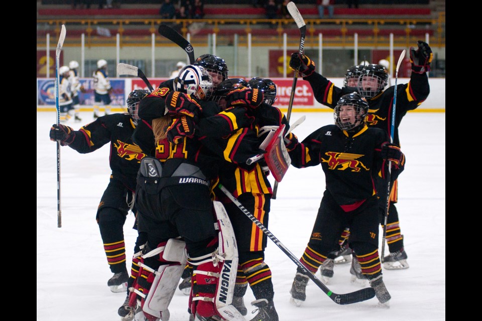 The Guelph Gryphons celebrate their Game 3 win over the Laurentian Voyageurs Sunday at the Gryphon Centre. Rob Massey for GuephToday