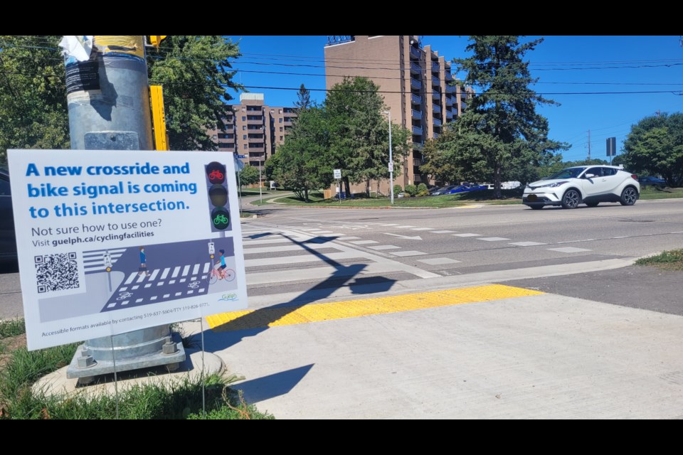 Signs are posted at the intersection at College Ave. W. and Vanier Dr. in Guelph, soon to be home to the city's first bicycle signal.