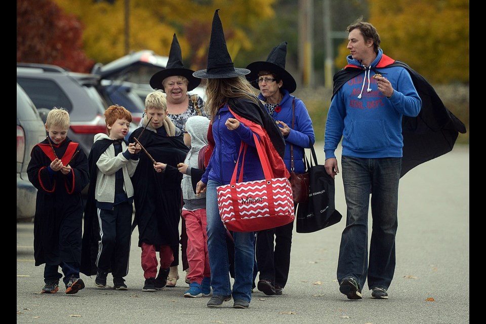 Family and friends arrive for the Let's Talk Science School of Wizardry and Witchcraft event Saturday, Nov. 5, 2016 at the University of Guelph. The Harry Potter-themed event mixed fun with science for young children. Tony Saxon/GuelphToday