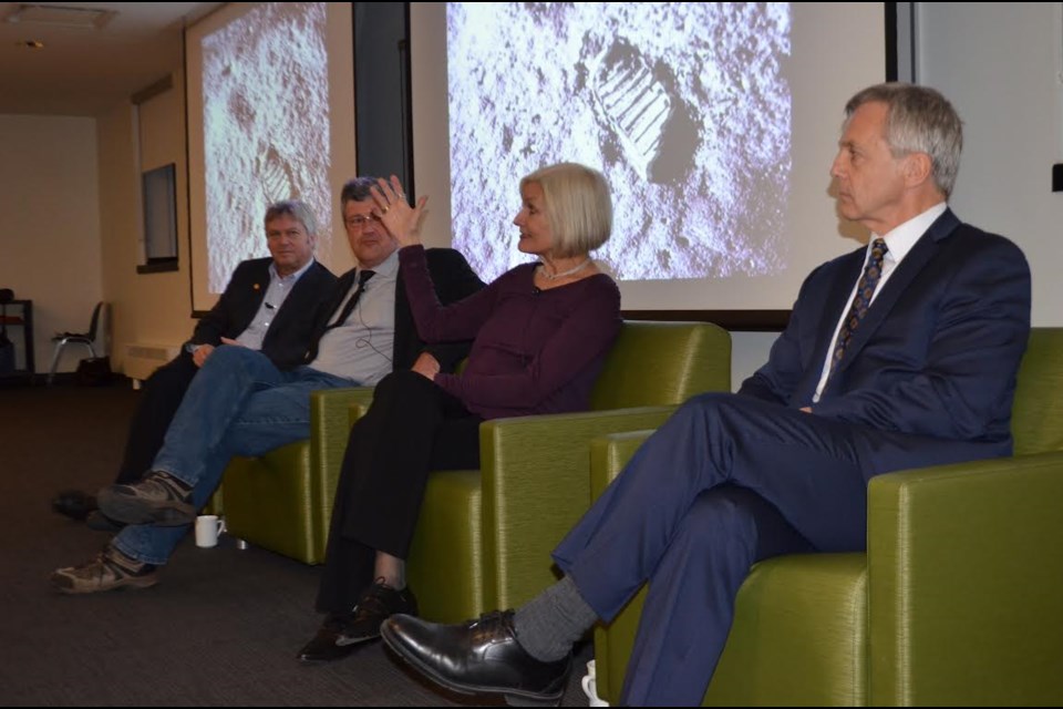 Panelists Mike Dixon, Ralf Gellert, Linda Billings and Bob Thirsk discuss the relative merits of sending humans to Mars during the Derry Dialogues at the University of Guelph. Troy Bridgeman for GuelphToday.
