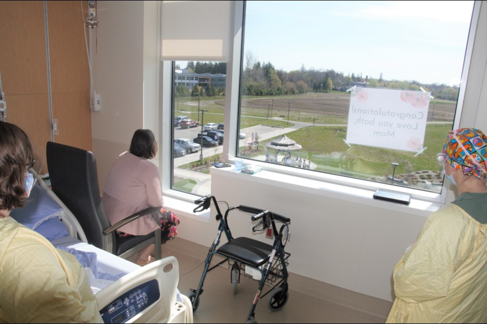 A patient at Groves Hospital was able to watch and listen to her son getting married at the healing garden. Supplied photo