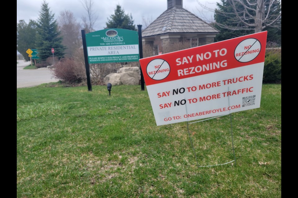 A community group, One Aberfoyle, has placed signs on their property to protest the rezoning.