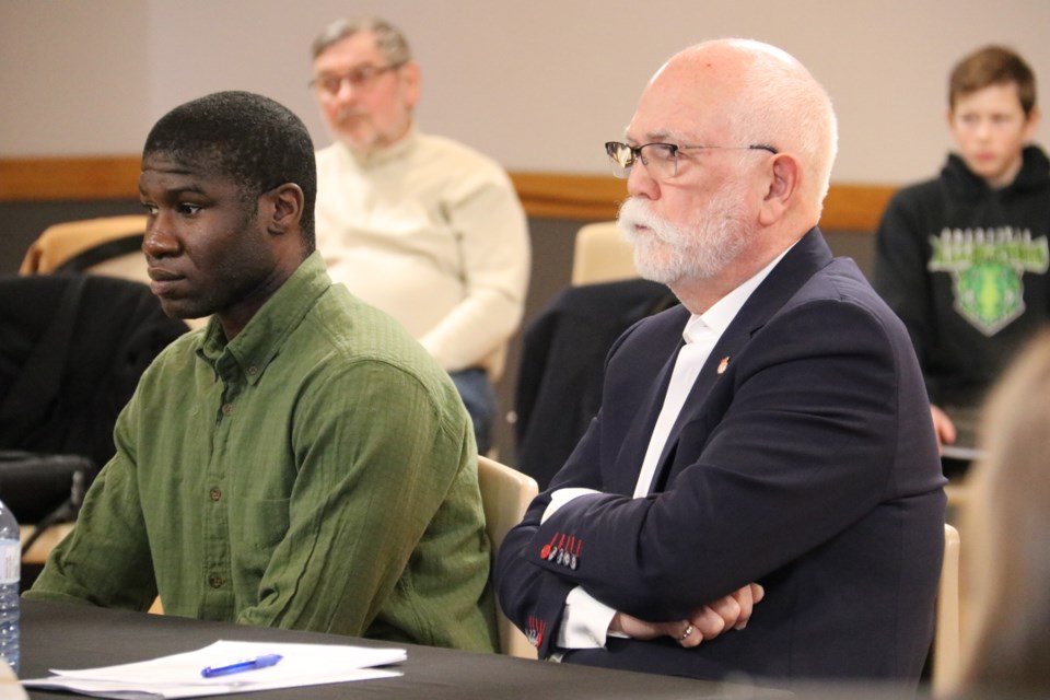 Bernard Akuoko and Bruce Taylor at the Puslinch council meeting on March 22. 