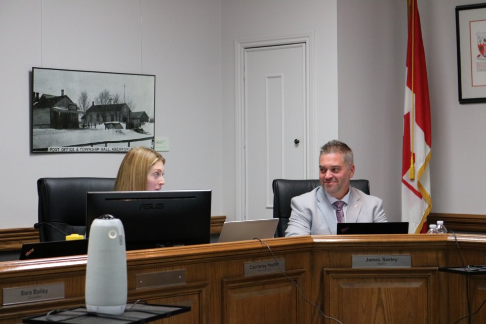 Puslinch Mayor James Seeley and acting CAO Courteny Hoytfox discuss the newly approved design concept for public access to Puslinch Lake from Travelled Road. 