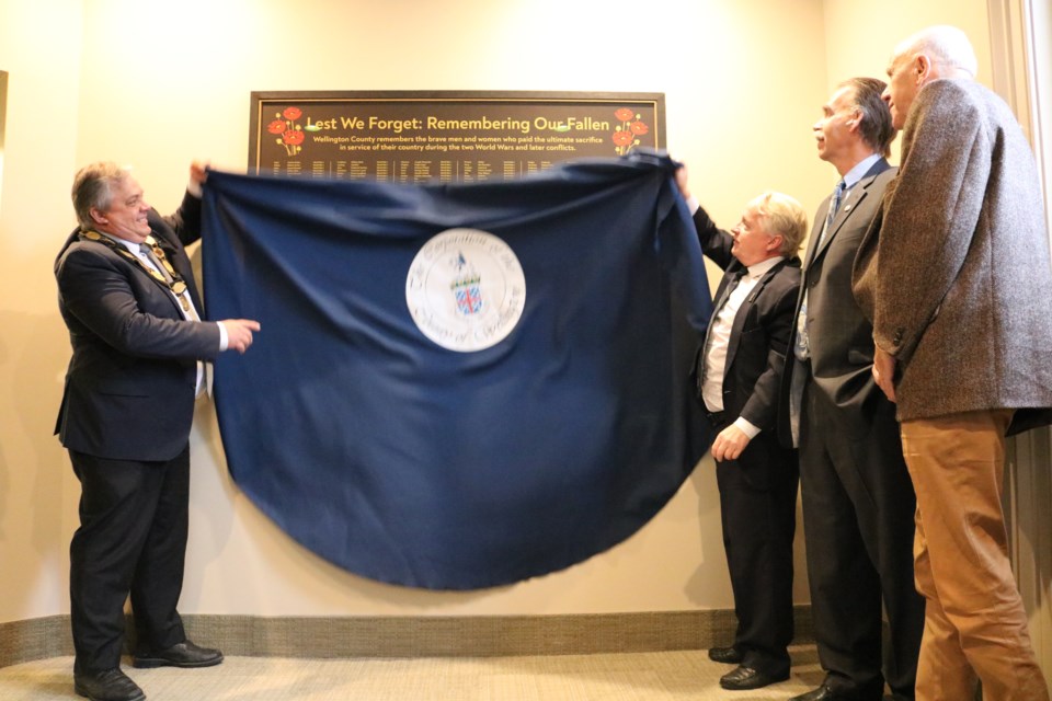 Warden Andy Lennox and County Coun. Chris White unveiled the plaque.