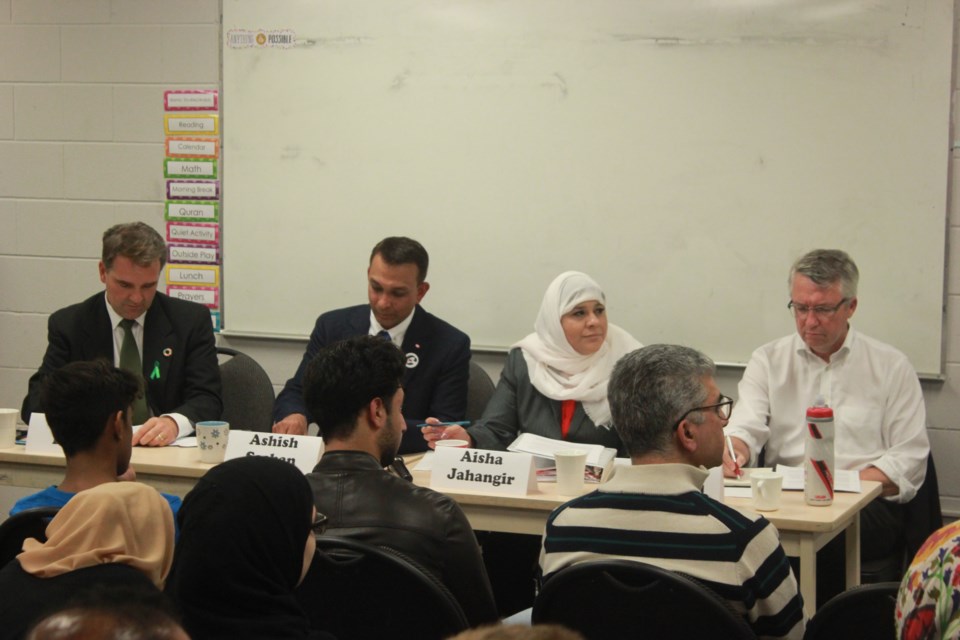 Candidates prepare for the debate. Anam Khan/GuelphToday