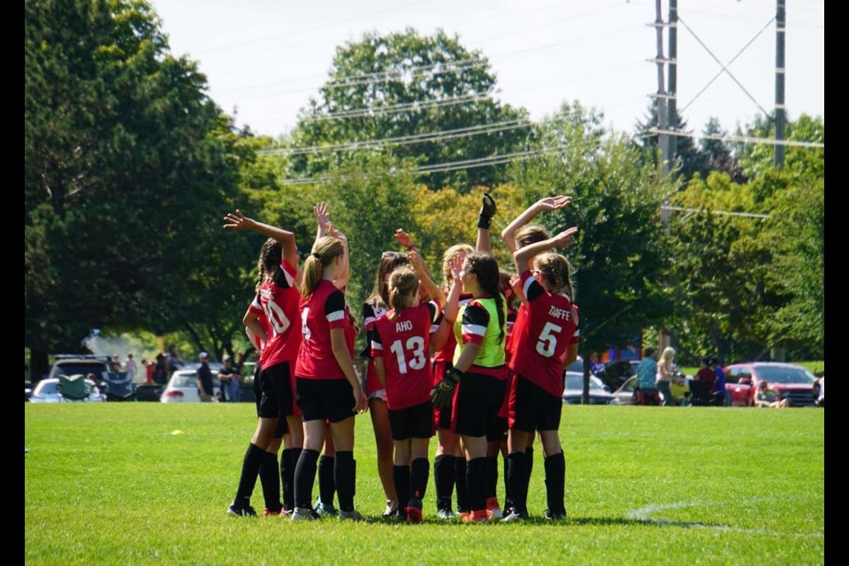 One of the Puslinch Minor Soccer Club teams celebrating a win this summer. 