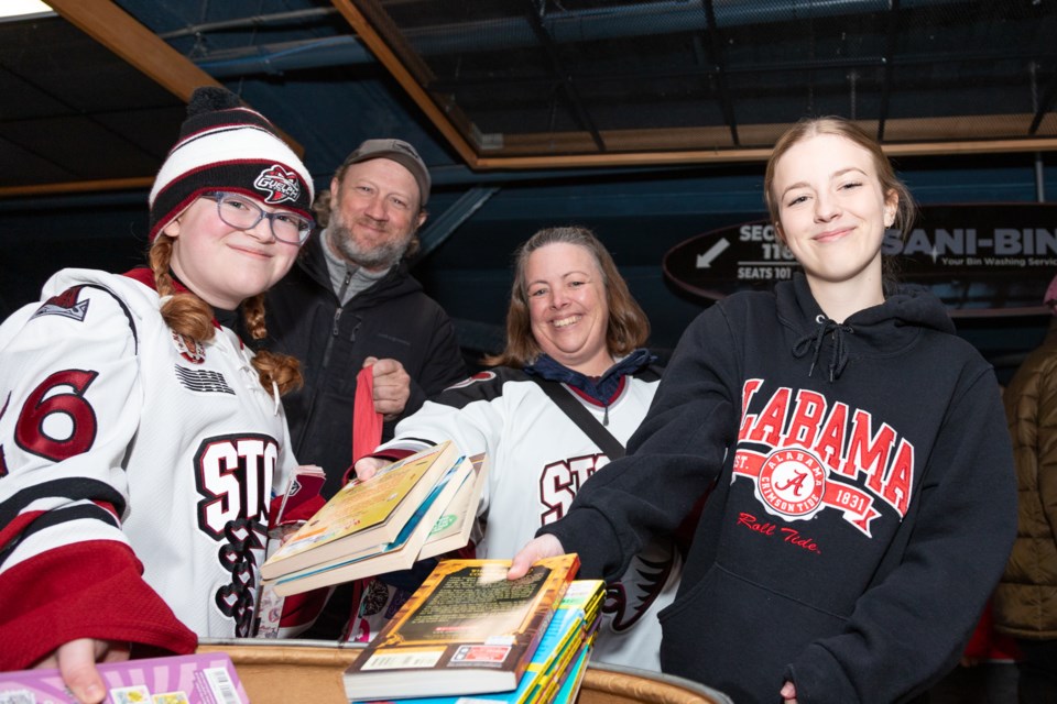 Hockey fans donated books to GuelphToday's Annual Books for Kids Night / Joel Robertson Photography