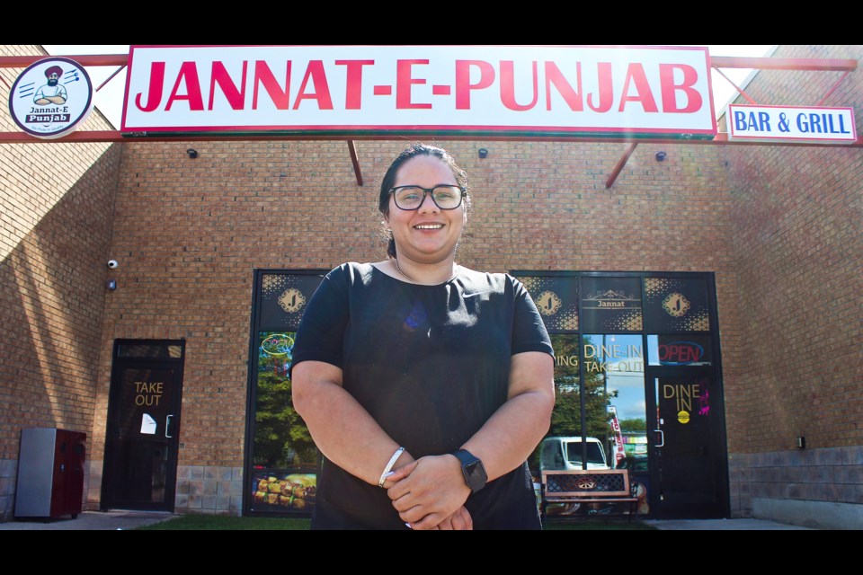 Owner Raman Deepkaur stands outside Jannat-E-Punjab Bar & Grill, which opened on Speedvale Avenue West in August.
