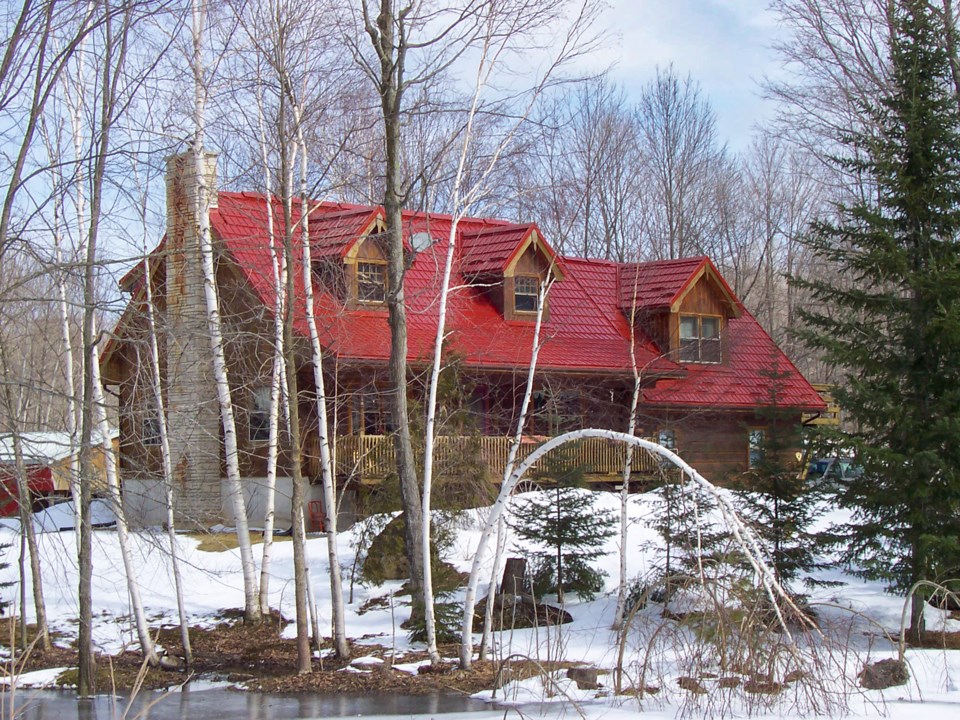 dark-logs-tile-red-roof