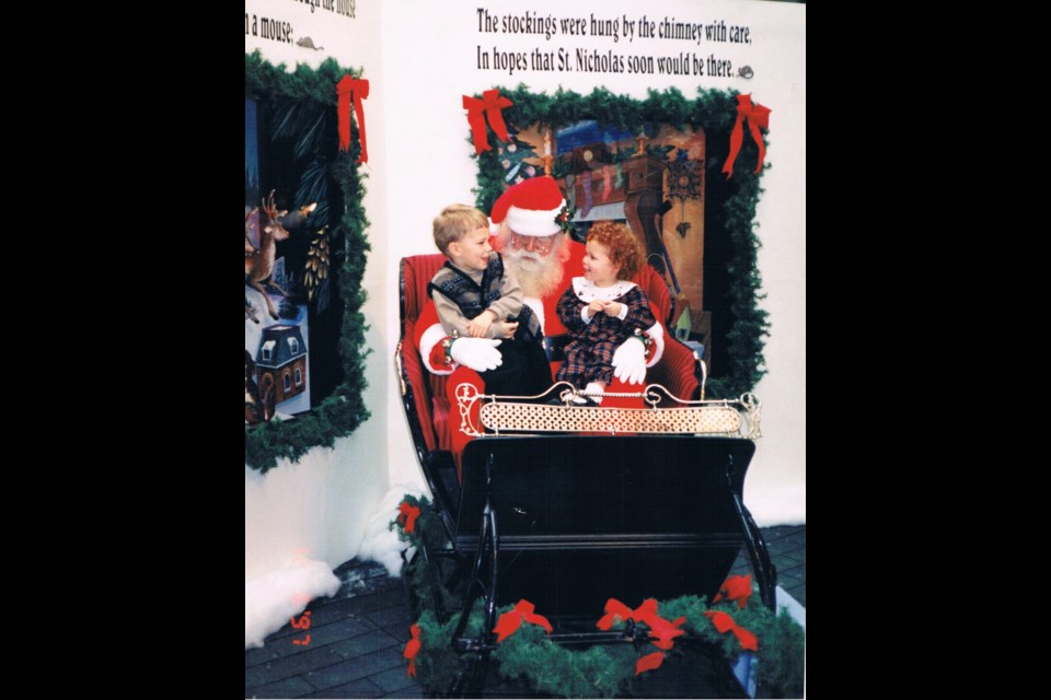 Visit with Santa at Stone Road Mall 1998. Tyler 5, Lizzie 3. - Wendy Vanderstam 