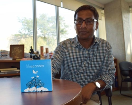 Associate director of informatics, Sujeevan Ratnasingham at the Centre for Biodiversity Genomics holds a LIfeScanner kit. Supplied photo