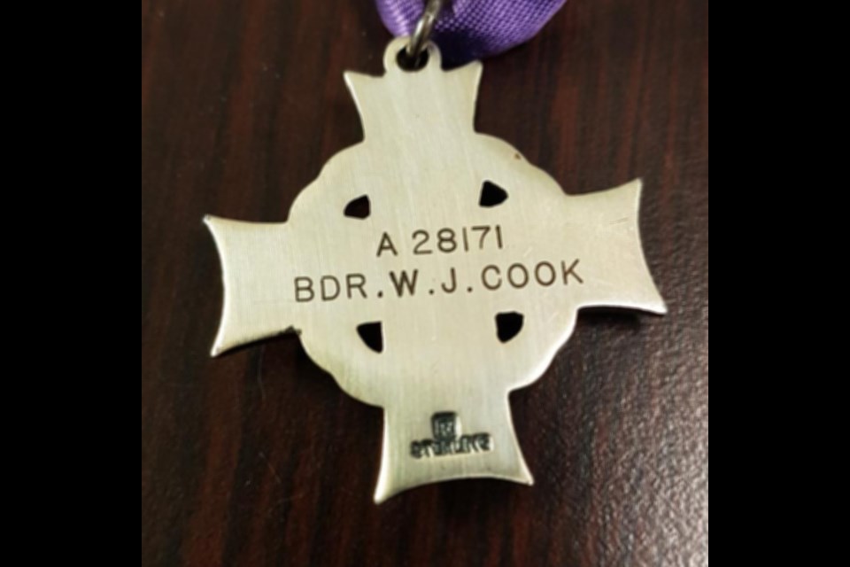 Back of the memorial cross inscribed with W.J. Cook. Supplied photo. 