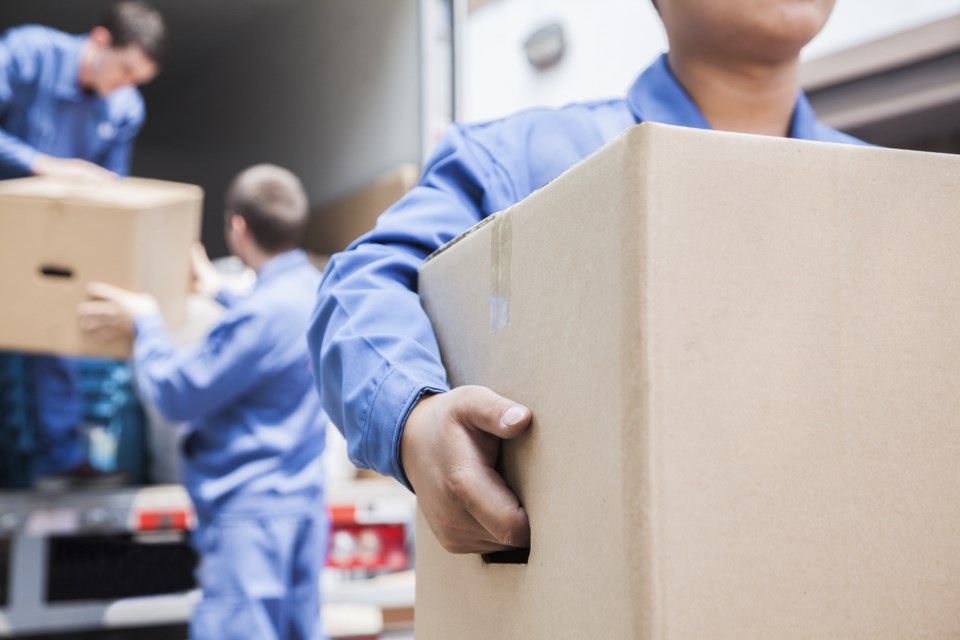 062719-movers-moving day-moving truck-movers-AdobeStock_55839525