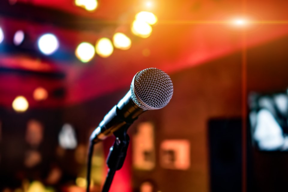 072518-karaoke-open mic-performance-microphone-musician-sing-bar-emcee-stage-AdobeStock_111094746