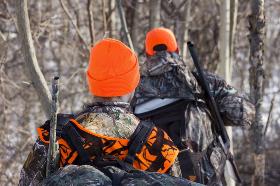102618-hunting-hunter-deer season-hunter orange-AdobeStock_101080263