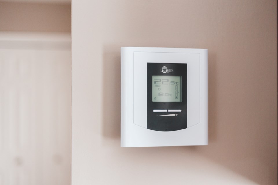 030922 - home heating - programmable thermostat