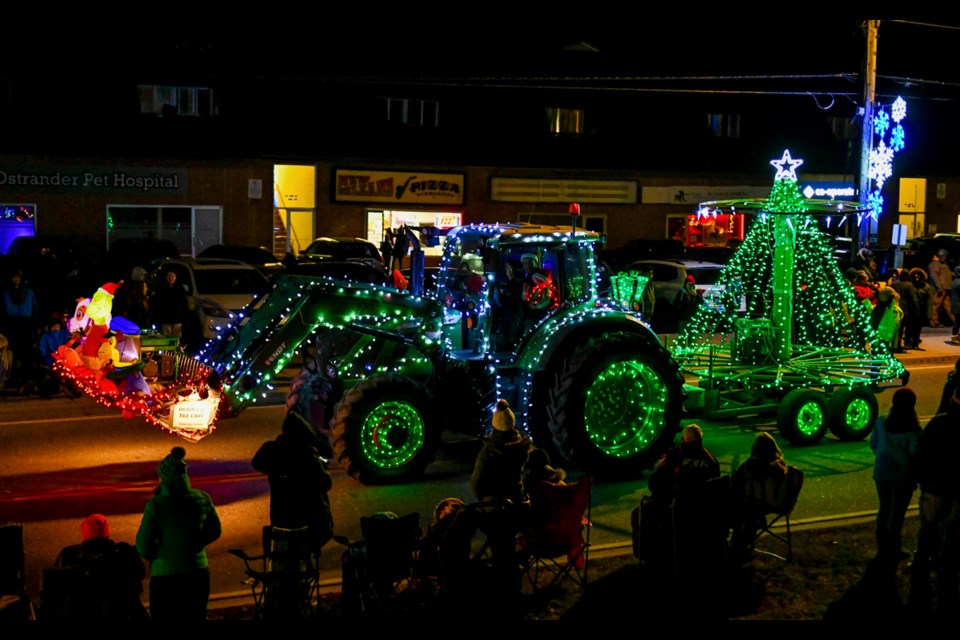 The 30th annual Rockwood Farmers' Santa Claus Parade of Lights hit the village Thursday (Dec. 8), with a large crowd enjoying the annual procession of decked-out tractors and combines.