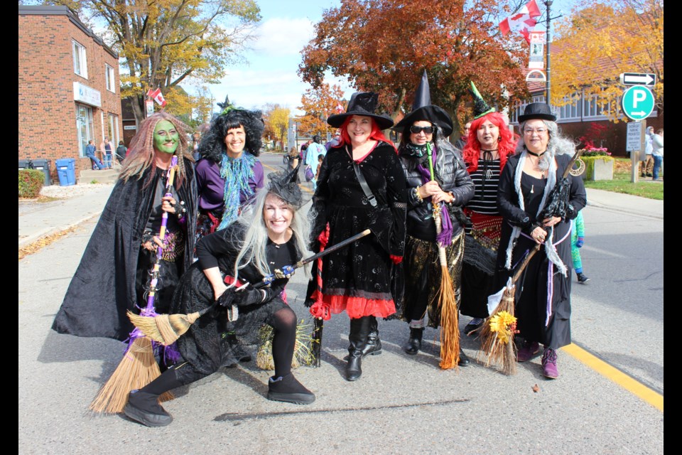 The 'Dancing Witches' entertained those who stopped by Trick or Treat on Mill and Main Streets. The group routinely stopped along the street to show off their choreography.