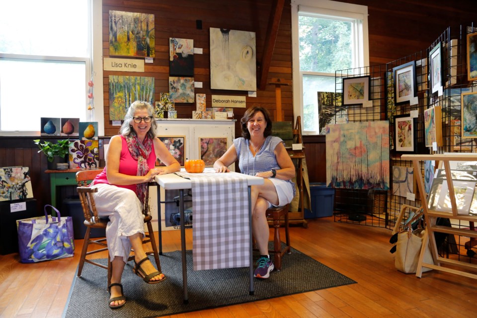 Lisa Knie (left) and Deborah Hansen share a space together at the Norval Studios and Gallery. 