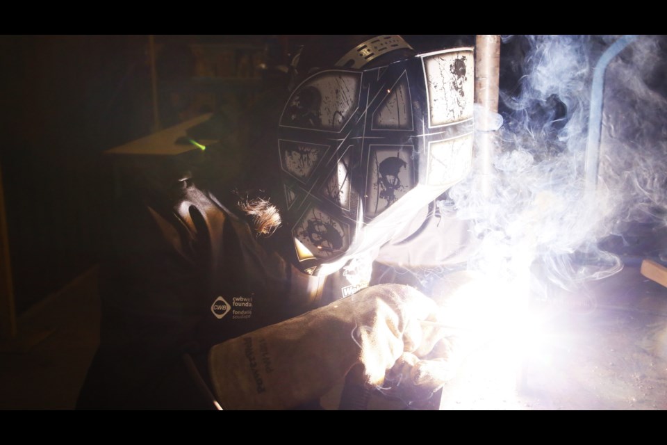 Evan Belonsky demonstrates his welding skills.