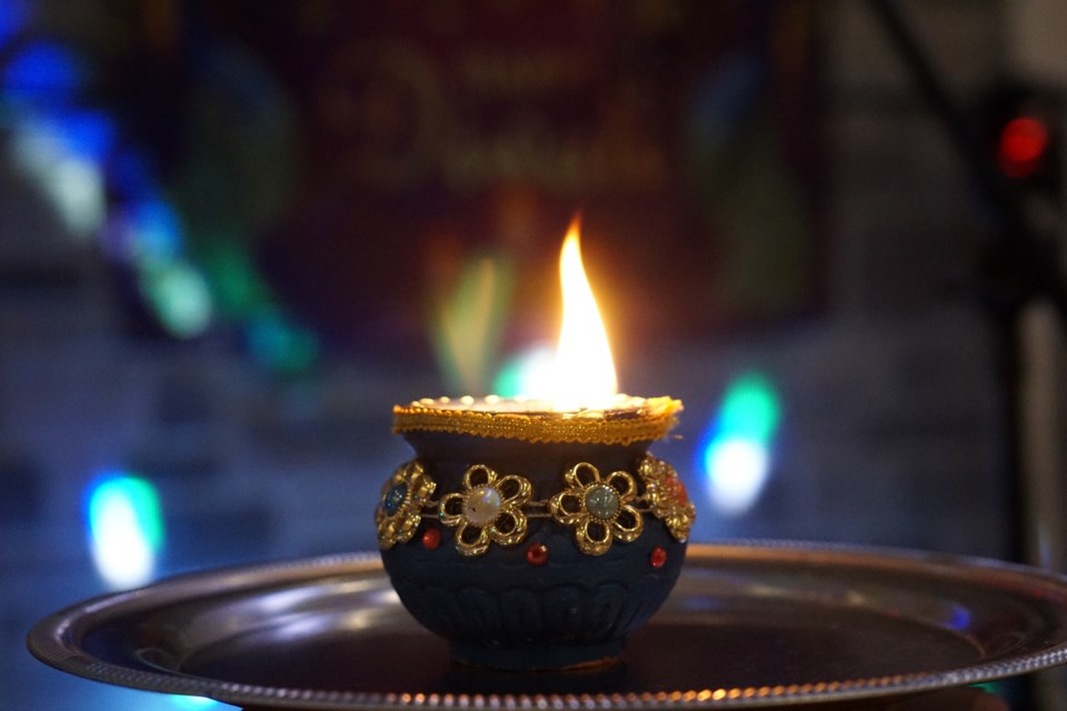 The diya was lit near the start of the event, to kick off celebrations. 