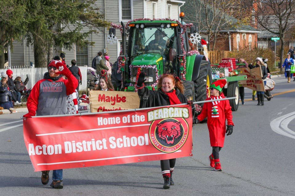 The Acton Santa Claus Parade hit town Saturday afternoon, with dozens of festive floats decked out in this year’s theme of ‘A Classic Christmas Movie.’